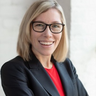 Ann F. Haynos, Ph.D., in front of white wall